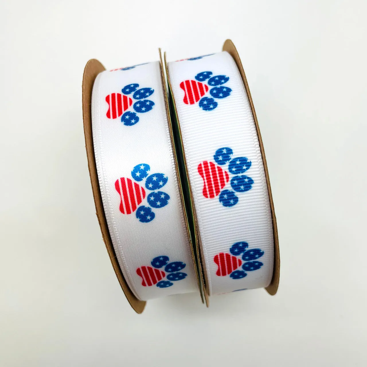 Patriotic paw print ribbon in red white and blue printed on 7/8"  white satin, 10  Yards